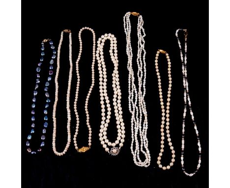 A collection of cultured and simulated pearl necklaces, a grey baroque shape cultured pearl necklace, tongue snap fastener ma