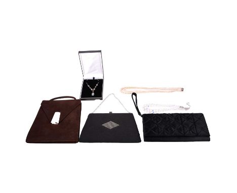 A 1930's suede handbag, two other handbags, three necklaces, the brown suede handbag having a three bead gilt metal fastener,