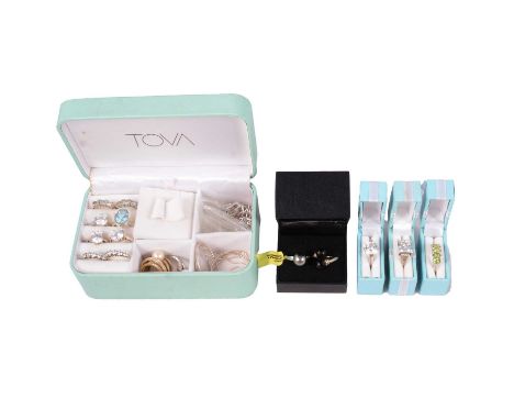 Two gemset 14 carat white gold rings and other gemset white metal rings and earrings, two cubic zirconia rings, each with thi