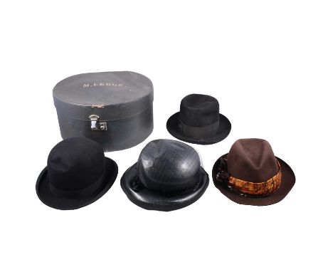 A hat box with a Dunn &amp; Co. bowler hat, two Panama hats, a lady's vintage Vyse hat, a hat box with a Dunn &amp; Co, bowle