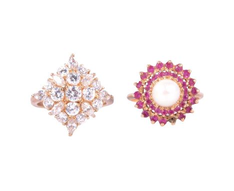 A cubic zirconia dress ring, pearl and pink stone ring, a 9 carat all yellow gold dress ring set with a cluster of clear cubi
