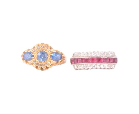 A ruby and diamond ring and a sapphire and diamond ring, a ruby and diamond ring, the nine square cut rubies channel set with