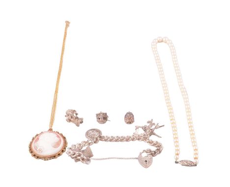 A cultured pearl necklace with diamond set clasp, charm bracelet, charms and cameo pendant, a cultured pearl necklace with di
