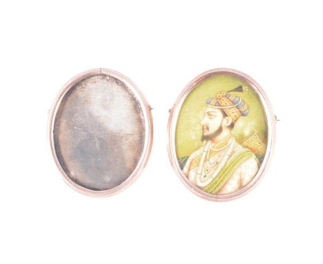 Indian interest - a portrait miniature of a Shah Jahan painted on ivory, collet set in an oval unmarked yellow metal mount wi