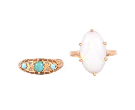 An opal solitaire ring and a turquoise ring, an oval cabochon cut opal 27x10mm, claw set in an all yellow metal mount ring si