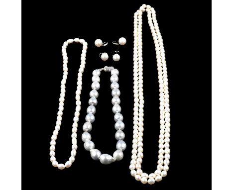 Three cultured pearl necklaces and two pairs of large cultured pearl earrings, a pale grey cultured pearl necklace, twenty-th