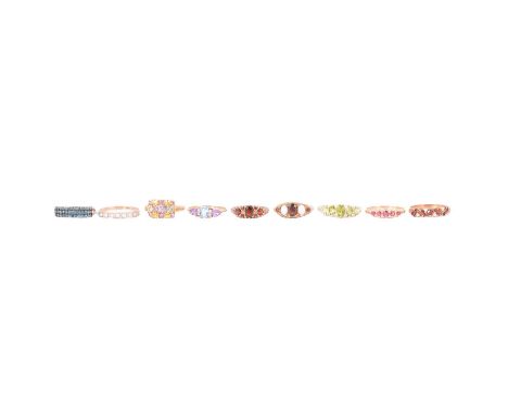 Nine 9 carat yellow gold gemset rings, blue diamond, garnet and opal, peridot and others, a blue diamond ring, the three rows