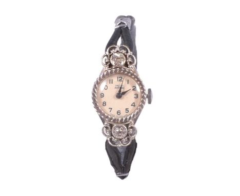 Smiths Astral - a diamond set 9 carat white gold lady's vintage wristwatch, 14mm circular cream dial with Arabic numerals and