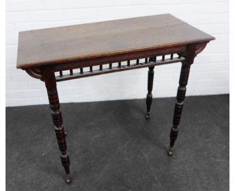 Oak side table, the rectangular top over a spindle gallery and on ring turned legs,  75 x 90cm 