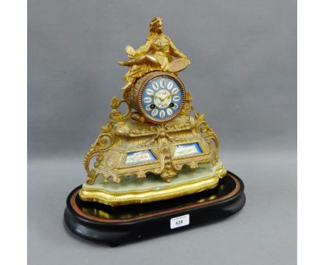 Gilt metal French style mantle clock, the turquoise porcelain dial with Roman numerals and a floral spray to centre, on a sha