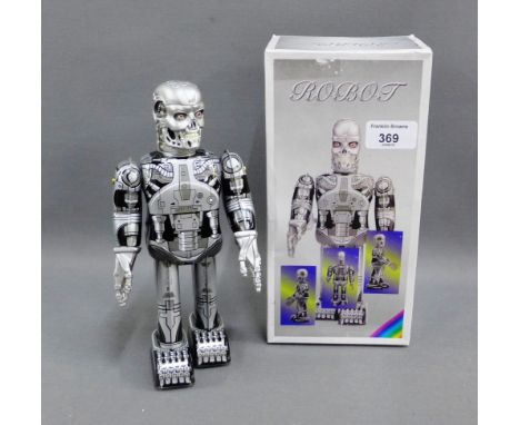 Robot, Terminator Skeleton, made in China, mid 1980's, clockwork with key, boxed, 23cm tall 