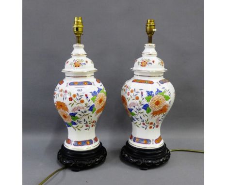 Pair of Chinoiserie octagonal table lamp bases on hardwood stands, (2) 