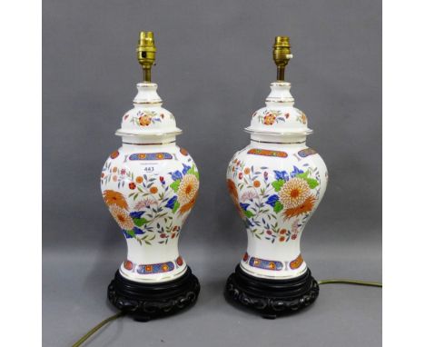 Pair of Chinoiserie octagonal table lamp bases on hardwood stands, (2) 