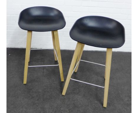 Pair of contemporary Hay bar stools with black sloping seats, light wood legs and metal stretchers, 75 x 44cm, (2) 