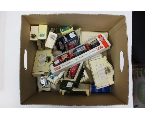 A group of late 20th century toy model vans and buses (all boxed) including examples promoting Walkers crisps, Exchange and M