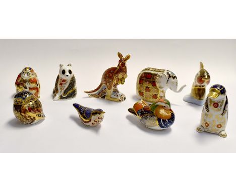 A collection of Royal Crown Derby animal paperweights to include duck, owl, wren, duck billed platypus, elephant, fish, ape, 