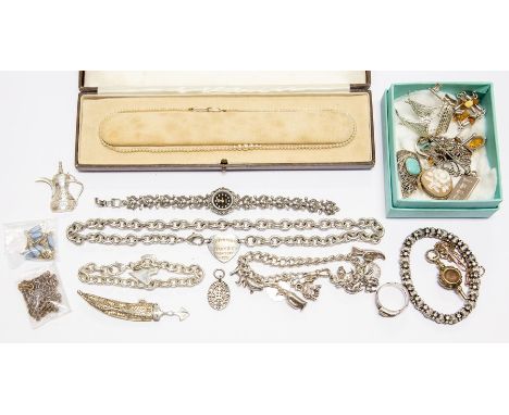 A 19th century gilt metal watch key; silver charm bracelet with charms, approx 2ozt; a white metal necklace and bracelet stam