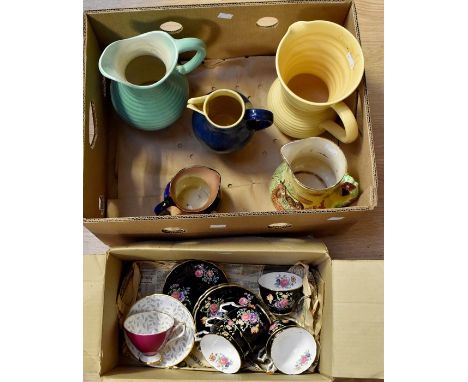 Six Aynsley cups and saucers late 1920's and a Kent cup and saucer toghther with five jugs, Lovetts Govencraft?