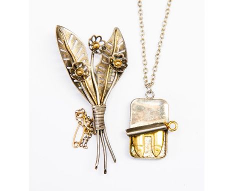 A sterling silver and 18ct gold floral spray brooch together with a pendant in the form of an opened sardine can, in silver a