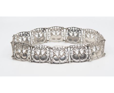 An Art Nouveau silver belt designed by Jessie M King (attributed) for Liberty and Co., each of the twelve square section pane