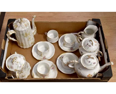 A Limoge part tea and coffee set comprising, teapot, coffee pot, sugar pot and cover, five cups and five saucers etc (one box