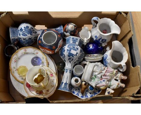 A collection of 19th and 20th Century ceramic and glass items to include jugs, pots, Delft, etc, along with paperweights Staf