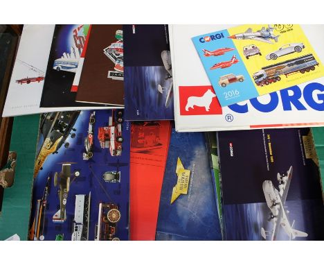 A quantity of assorted sales brochures including Corgi; EFE; Maisto; Sun Star and others. (one box)