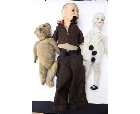 A collection of various toys to include a puppet, clown doll and teddy bear