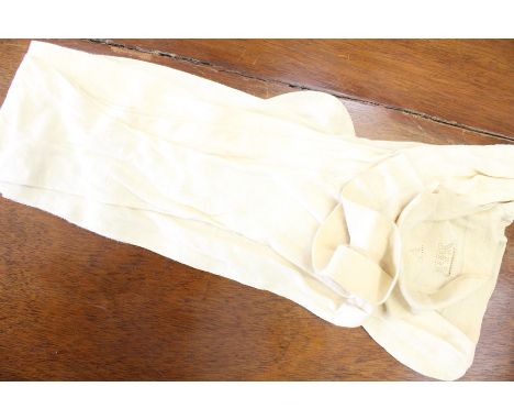 Wool and silk cream stockings circa 1870/80, made by Brettle, who held the Royal Warrant! Cream stockings with a knitted crow
