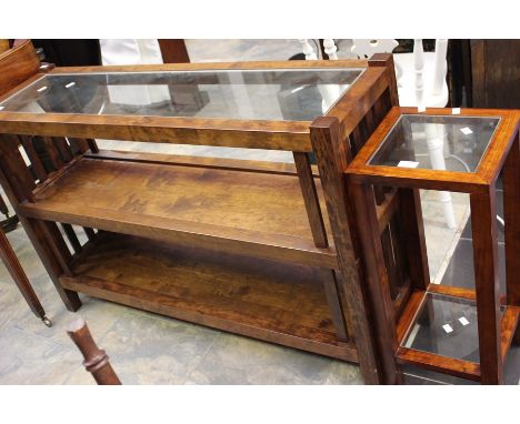 A modern mahogany open bookcase with a glazed inlay top, two other tier shelves; another similar lamp stand