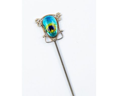 Newlyn- An Art Nouveau Newlyn enamel hat pin in the form of a peacock feather, silver scroll surround, terminal size approx. 