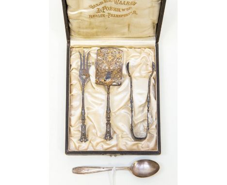 A boxed set of late 19th Century implements to include cake slice and fork and sugar tongs (Berlin) 800 standard; a silver te