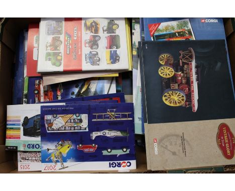 A quantity of assorted sales brochures including Corgi; EFE; Maisto; Sun Star and others. (one box)
