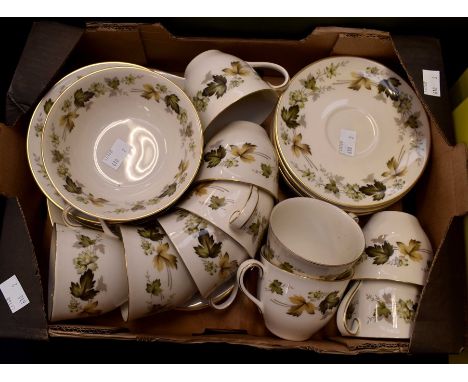 A collection of Royal Doulton Larchmont pattern tea wares including thirteen cups, fourteen saucers, seventeen plates, two ju