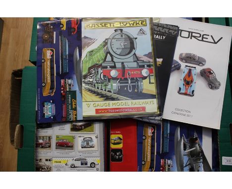 A quantity of assorted sales brochures including Corgi; EFE; Maisto; Sun Star and others. (one box)