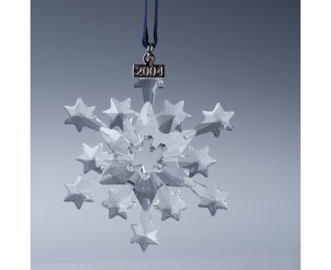 This is the Swarovski 2004 Annual Edition Christmas Ornament, featuring a stunning crystal snowflake design. This collectible