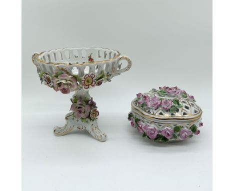 Elegant porcelain reticulated centerpiece and covered box from the Formalities by Baum Bros collection, each featuring intric