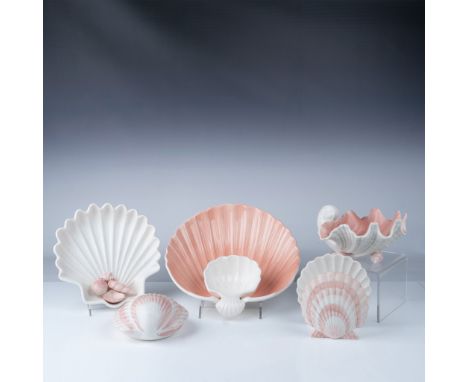 A charming five-piece Fitz and Floyd ceramic set inspired by seashell designs, featuring a soft pink and white palette. Inclu