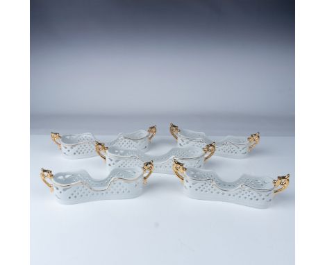 A set of five porcelain silverware holders by Porcelain Treasures, designed for buffet service. These reticulated holders fea