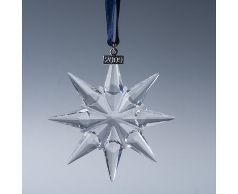 Presenting the Swarovski 2009 Annual Christmas Ornament, a breathtaking star-shaped crystal creation designed with the brand'