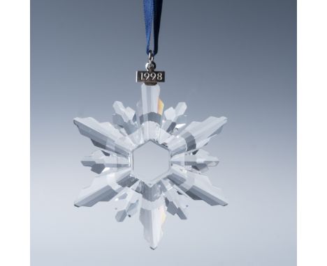 This exquisite Swarovski 1998 Annual Edition Christmas Ornament features a stunning crystal snowflake design, showcasing Swar