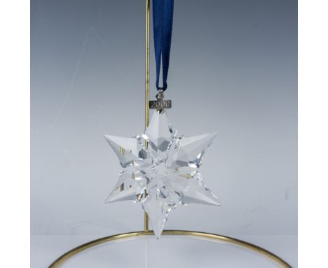 This exquisite Swarovski Annual Edition 2000 Christmas Ornament is a finely crafted snowflake, emblematic of Swarovski's mast