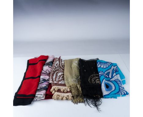 A vibrant collection of eight scarves and wraps, featuring a variety of designs, colors, and materials. This lot includes sil