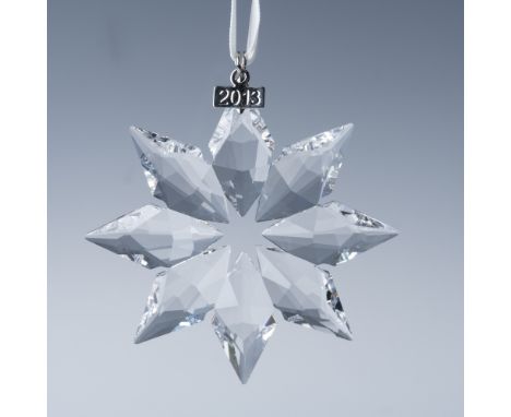 This exquisite Swarovski 2013 Annual Edition Christmas Ornament is a stunning collectible crafted from precision-cut crystal.