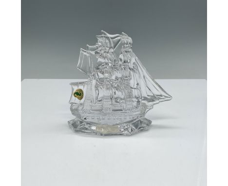 A Waterford lead crystal tall ship sculpture featuring exquisite craftsmanship and intricate detailing. The piece showcases a