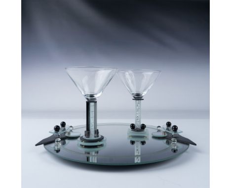 A striking modernist cocktail display designed and signed by George Ponzini, featuring two glass martini-style stems mounted 