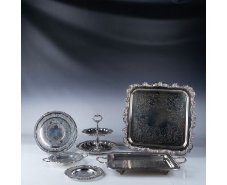 A charming 6-piece silver-plated serving set featuring two rectangular trays with ornate handles, two round pierced serving p