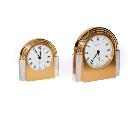 A brass and silvered cased desk timepiece, signed Luxor, retailed by Garrard &amp; Co 112 Regent St, W1, 11cm high, together 
