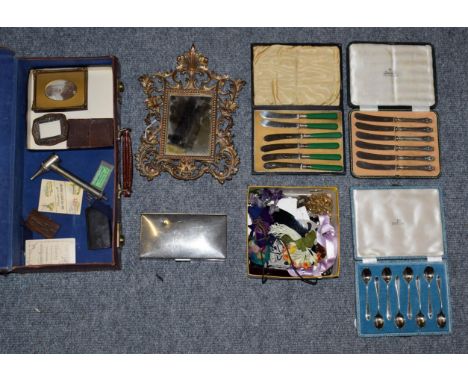 Assorted items including three cased flatware's, plated cigarette box, metal easel framed mirror, collectors items, buttons, 