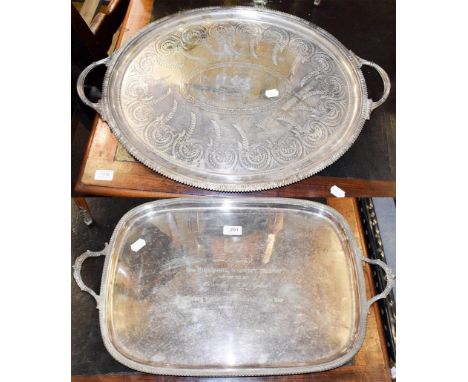 A large oval shaped twin handled serving tray with presentation inscription 'cutters sailing race, challenge prize, presented